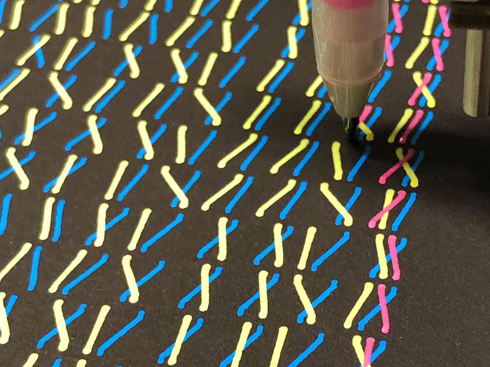 Printing in progress - the yellow and blue wires are complete, pink is being drawn