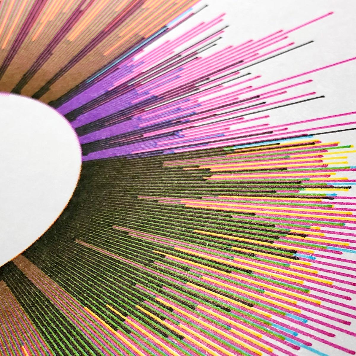 A close-up view of many coloured lines positioned around a white circle